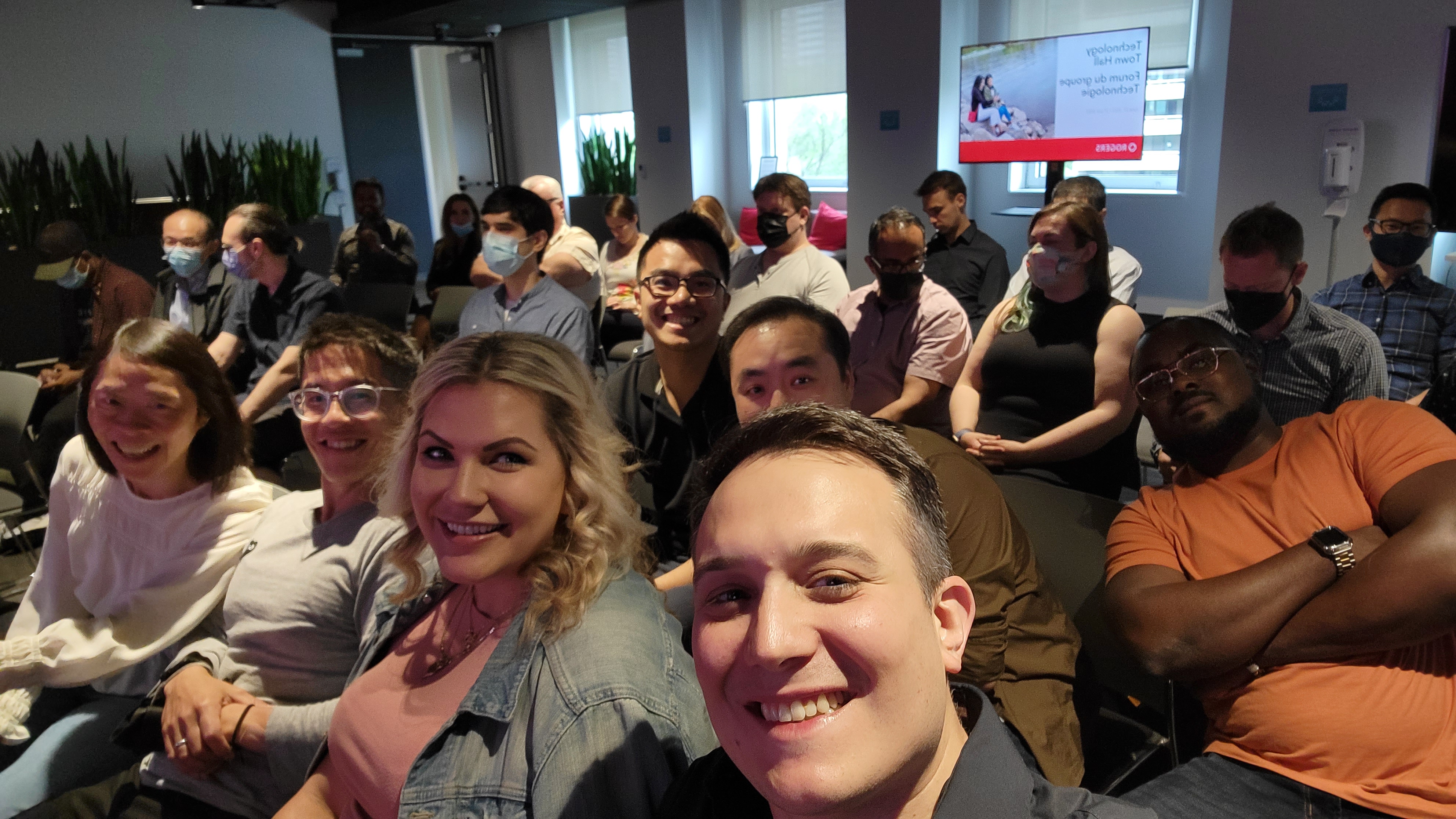 Mario Cardoso with Rogers design and product colleagues at a team gathering